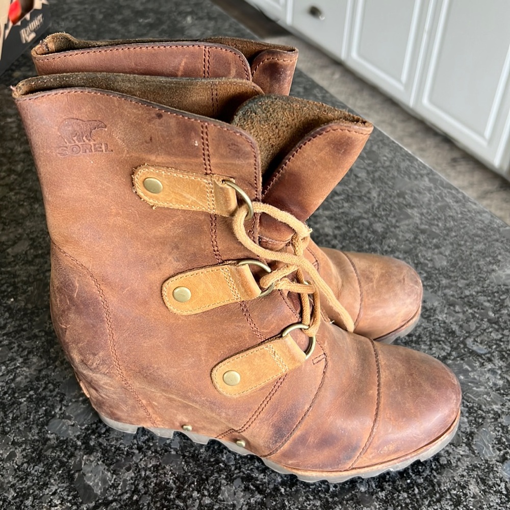 Lace up wedge Sorel booties.